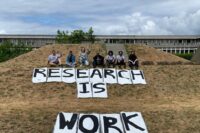 Research is Work banners & Union organizers